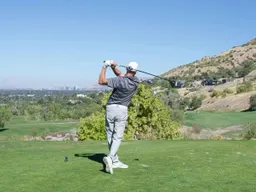 Golfer swing at Brighton Golf Tournament