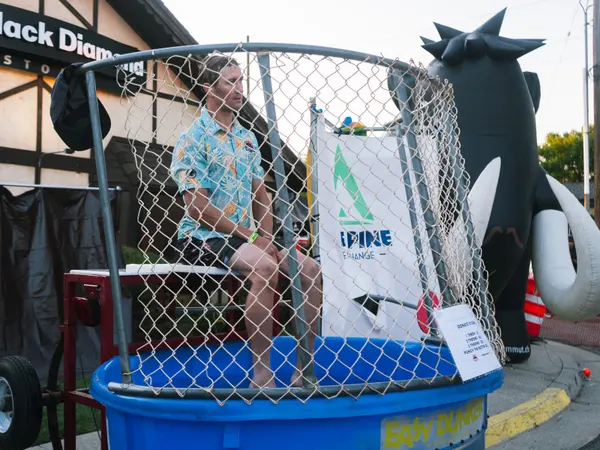 Dunk tank outside Black Diamond HQ at a previous Backcountry Benefit