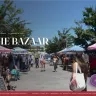 Shoppers browsing booths at The Summer Bazaar at Millcreek Common