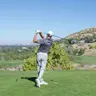 Golfer swing at Brighton Golf Tournament